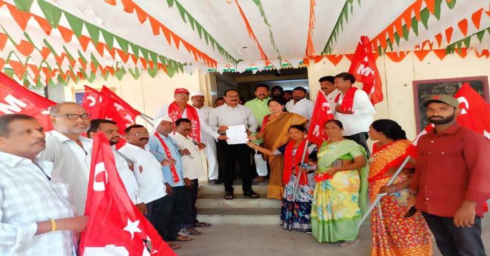 The land under Survey Number 700 must be leveled and allotted as plots.