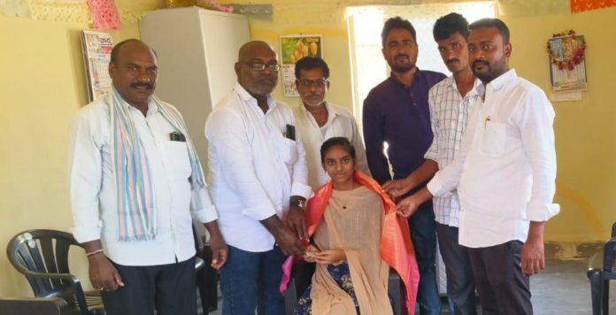 Sarpanch Bandiswamy felicitated the Mandal topper