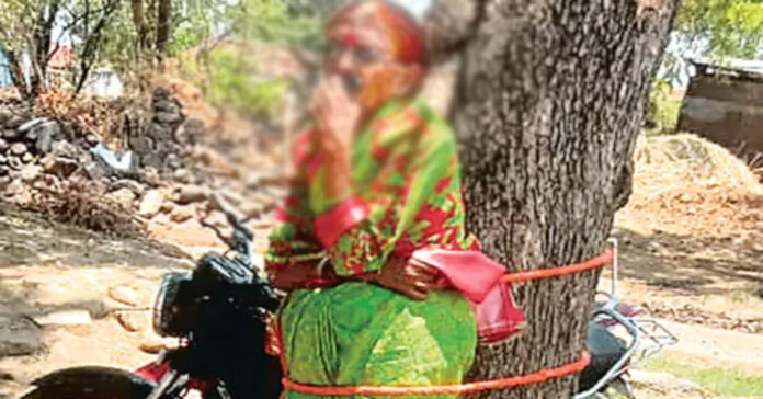 భర్త మోసం.. భార్యను చెట్టుకు కట్టేసి..!