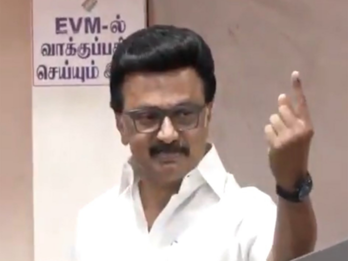 his right to vote at the polling station in Chennai