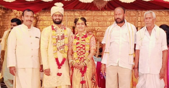 Tadicherla PACS Chairman Mondayya blessed the bride and groom.