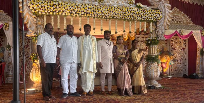 PACS Chairman Mondayya blessed the bride and groom.