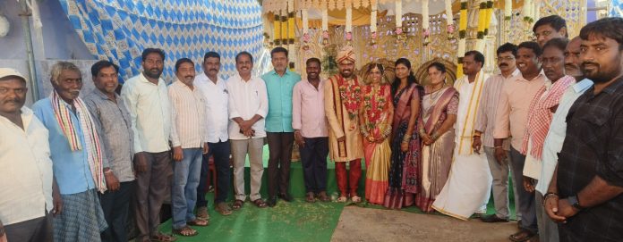 Former MLA Putta blesses the bride and groom