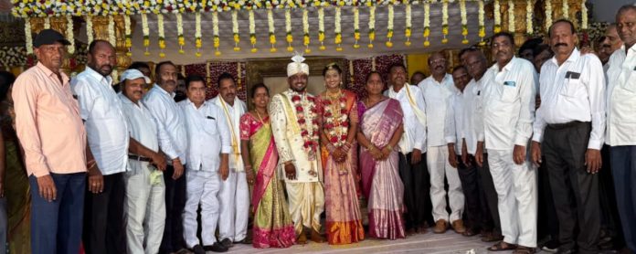 PACS Chairman Mondayya blessed the bride and groom.