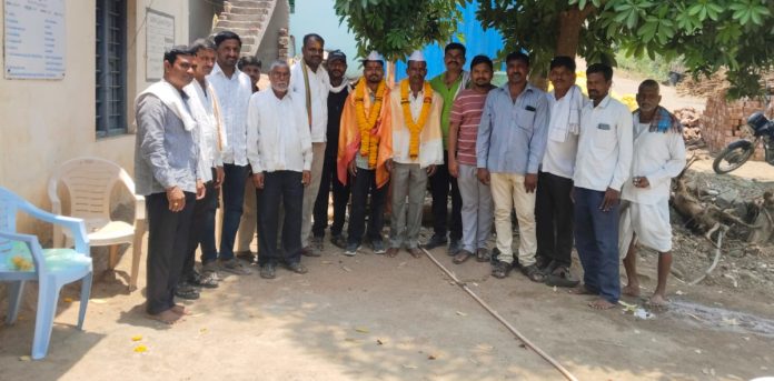 Sarpanch felicitates young man who completed BHMS education