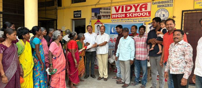 Rice distribution to the poor in Vidya High School