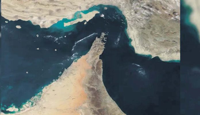 Fire on a wooden boat near Hormuz.