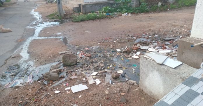 Sewage flowing on the road... officials turn a blind eye.