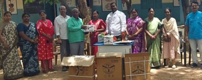 Donation of 12 ceiling fans to the Kaligot Government School.