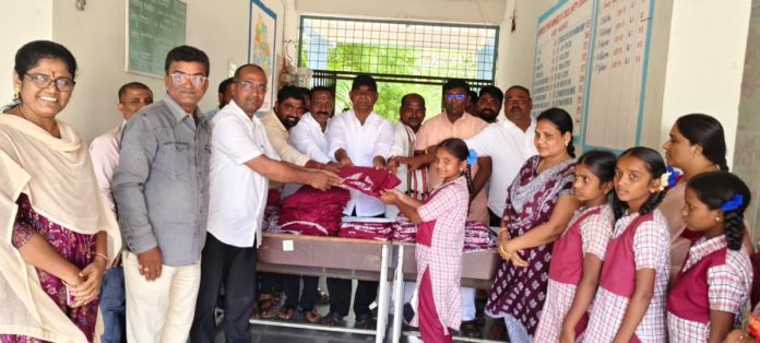 Distribution of uniforms to Kasturba students