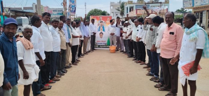 Milk poured over the portraits of Sonia Gandhi and CM Revanth Reddy.