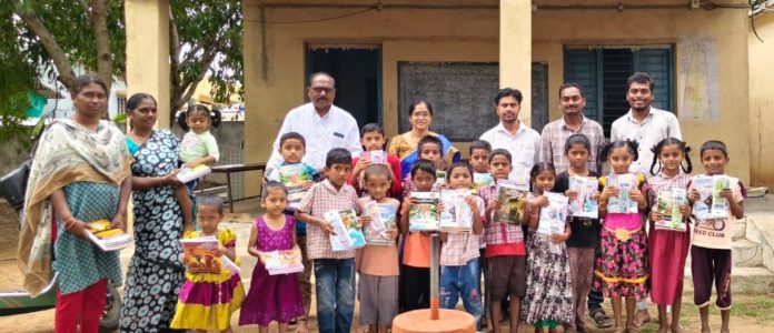 Distribution of notebooks and study material to students.