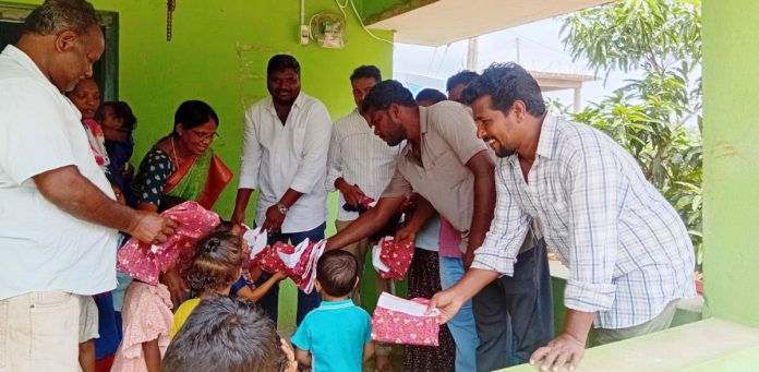 Distribution of uniforms to Anganwadi children