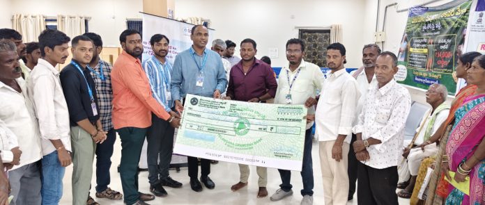 Insurance cheques handed over to the families of the deceased.