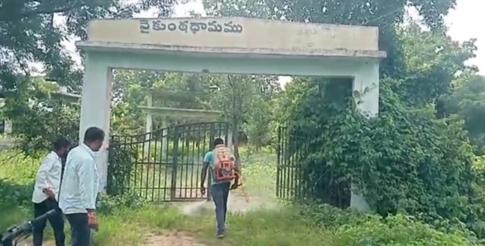 Spraying herbicide at the Kaulas Vaikuntha Dhamam.